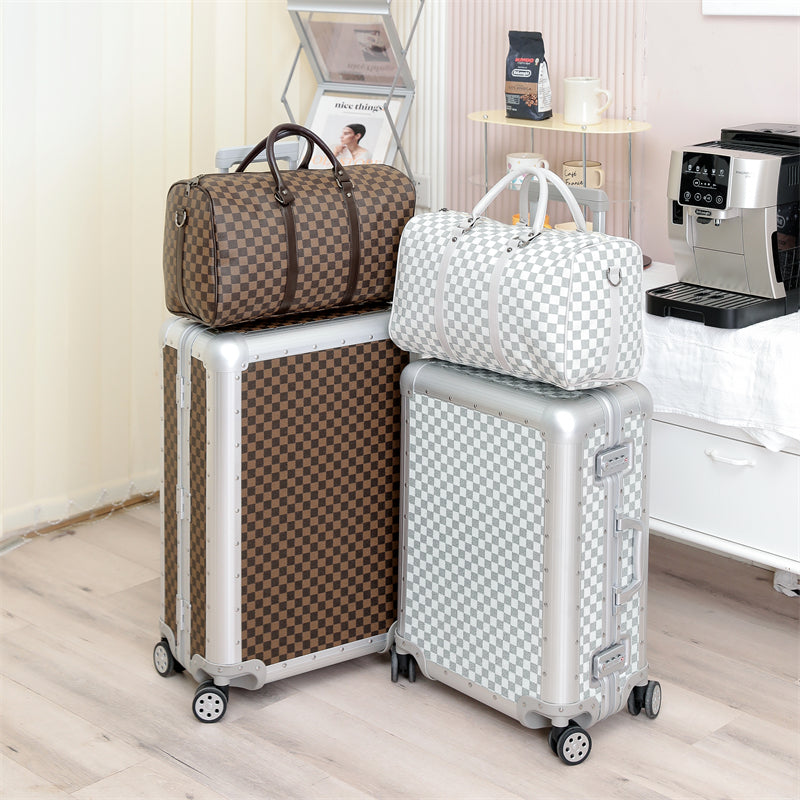 Brown suitcase and duffel set, lifestyle shot