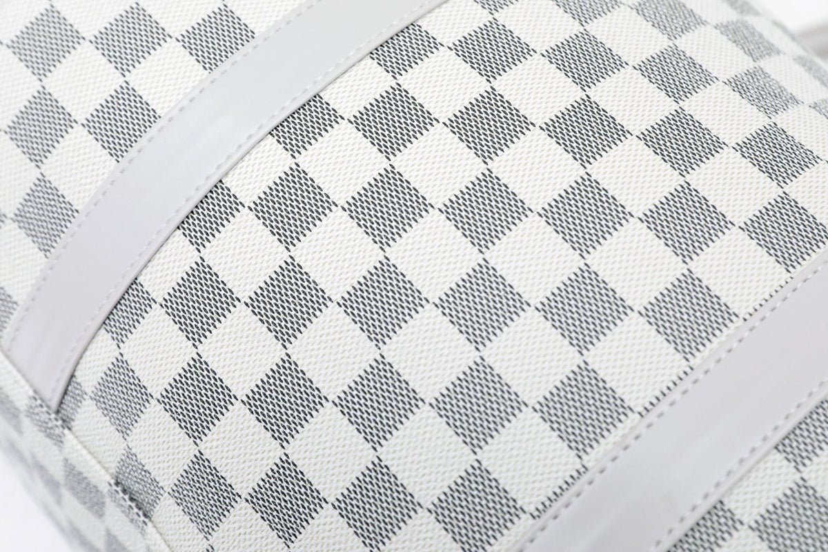 Silver duffel bag checkered fabric texture
