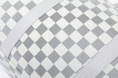 Silver duffel bag checkered fabric texture