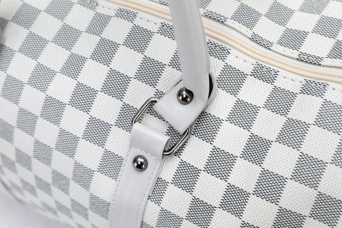 Silver duffel bag strap ring detail