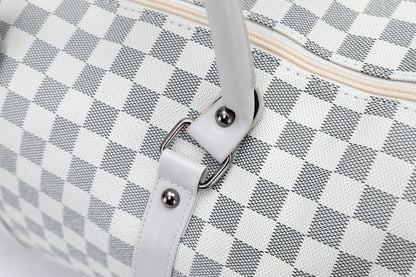Silver duffel bag strap ring detail