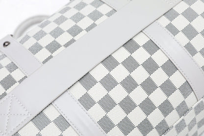 Silver duffel bag strap and checkered fabric